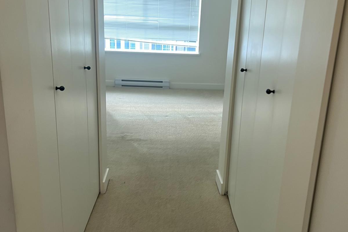 Empty condo hallway cleaned and ready for handover after a move out clean in Vancouver BC